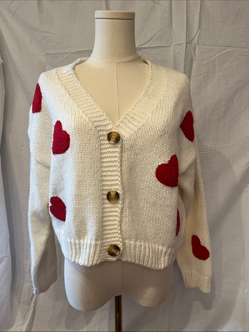 Cream Button-Front Cardigan with Red Heart Accents
